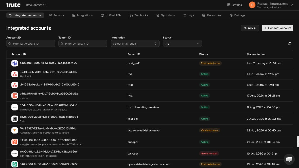 Integrated accounts list in dark mode, showing account IDs, tenant IDs, and connection statuses